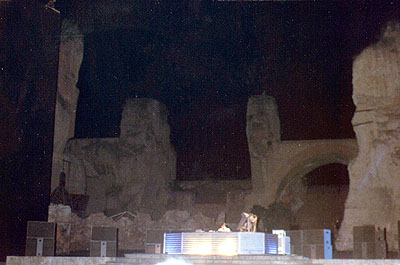 TVangelis playing his synths on stage.